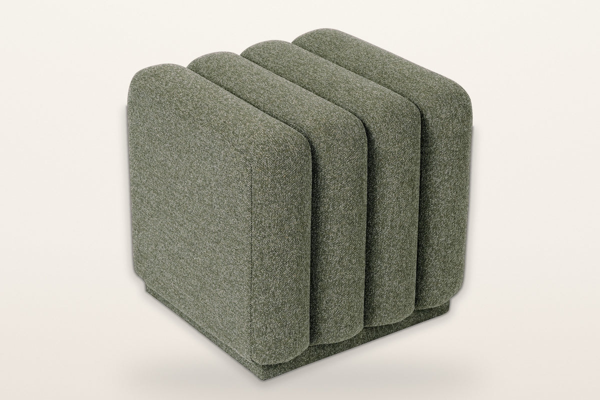 Abbadia channel-tufted square ottoman in moss, three-quarter view on a warm white studio backdrop