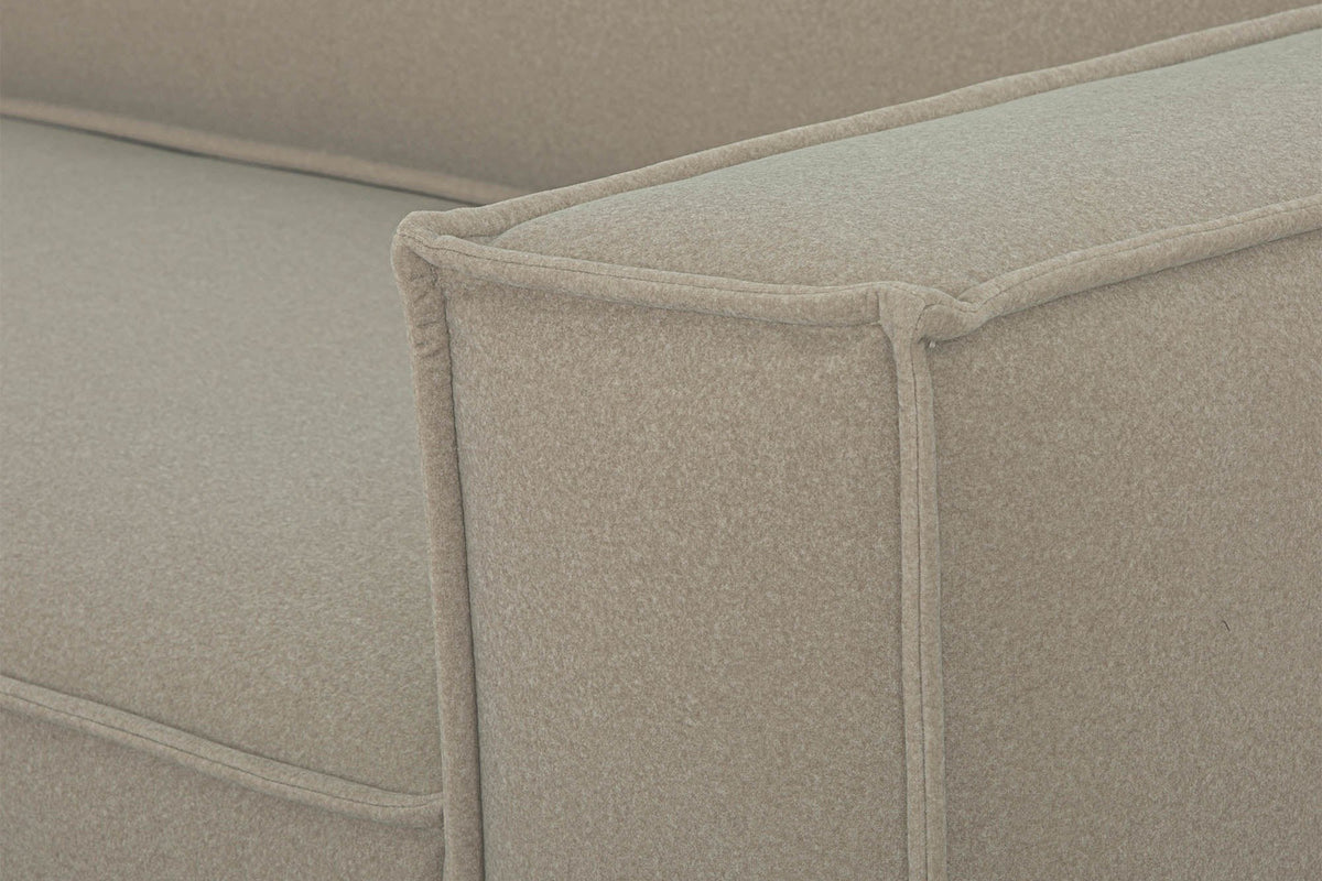 Close-up of the Agerola arm: flat flange seams frame the front and top of the square track arm