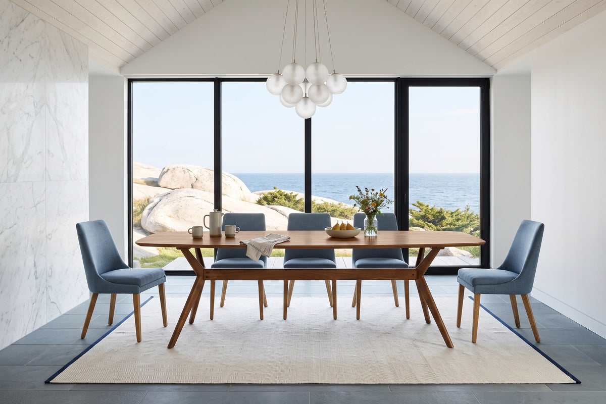 Amandola dining table in Light Walnut in a Peggy's Cove coast house with a white marble wall
