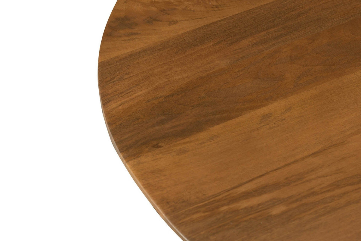 Close-up of the round Apecchio top in walnut and teak: the thin edge and the figured mango grain