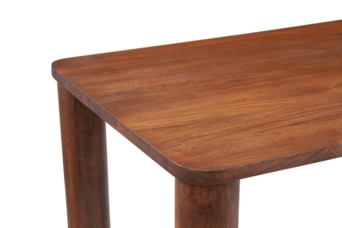 Close-up of an Arcevia corner in Brown: the rounded corner and eased edge of the mango top over two round legs