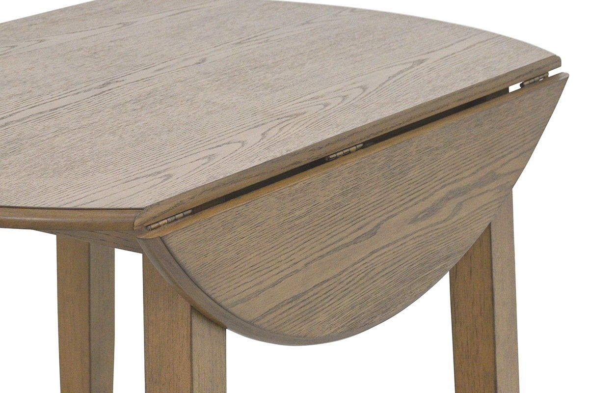 A dropped leaf of the Arden table in Walnut hanging straight down from its hinges under the straight edge of the centre panel