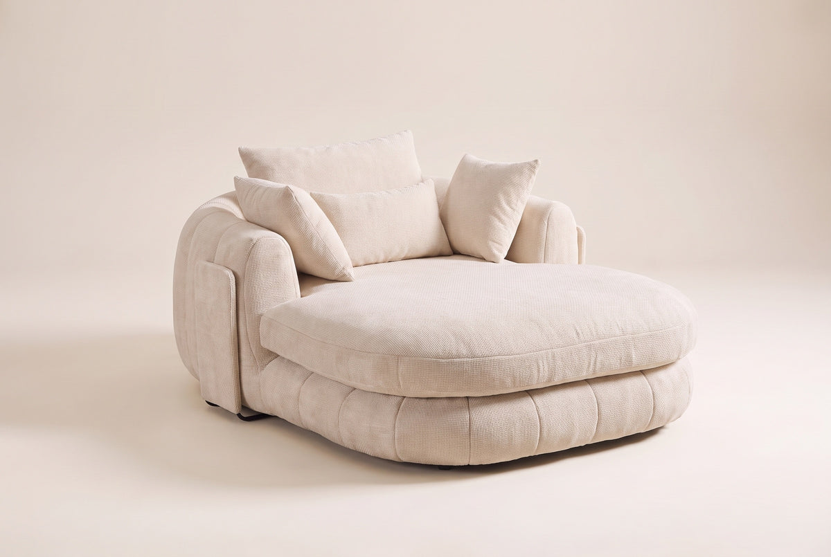Asolo chenille chaise lounge chair in Beige, three-quarter view on a warm off-white backdrop