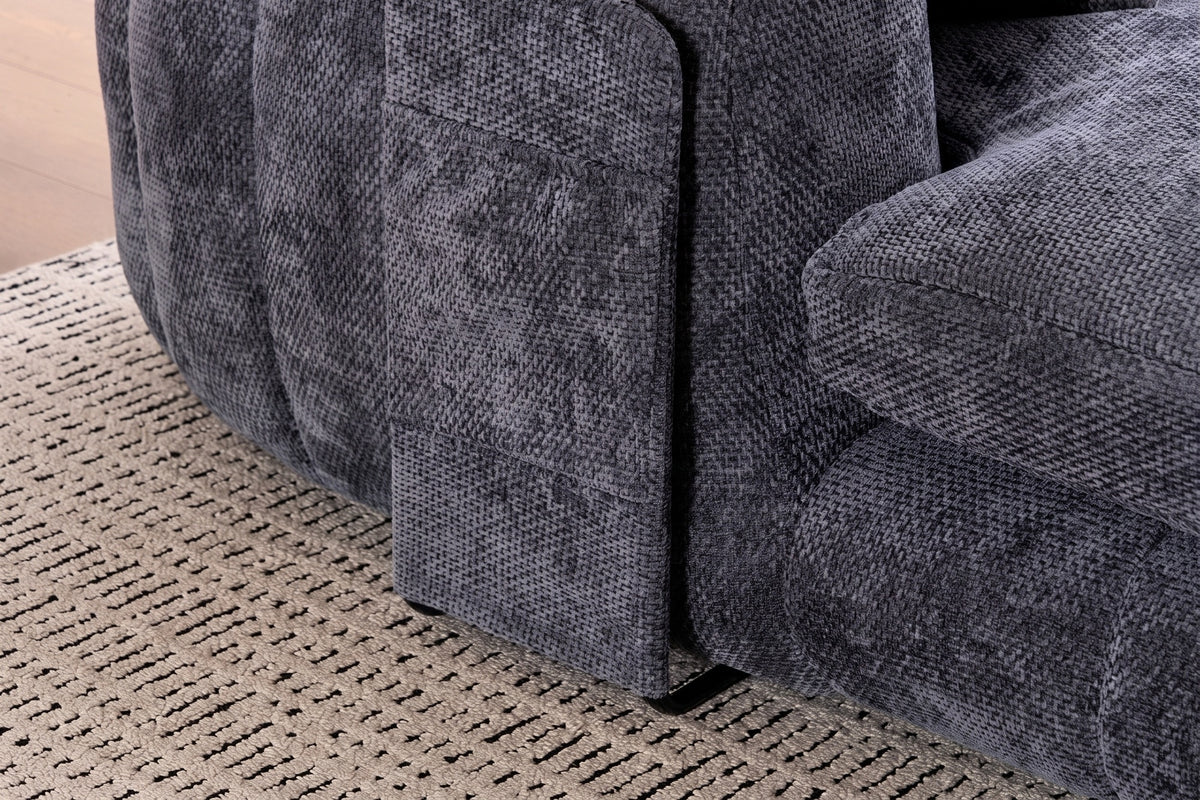 Close-up of the grey Asolo arm with its side pocket and the black metal sled leg at the floor
