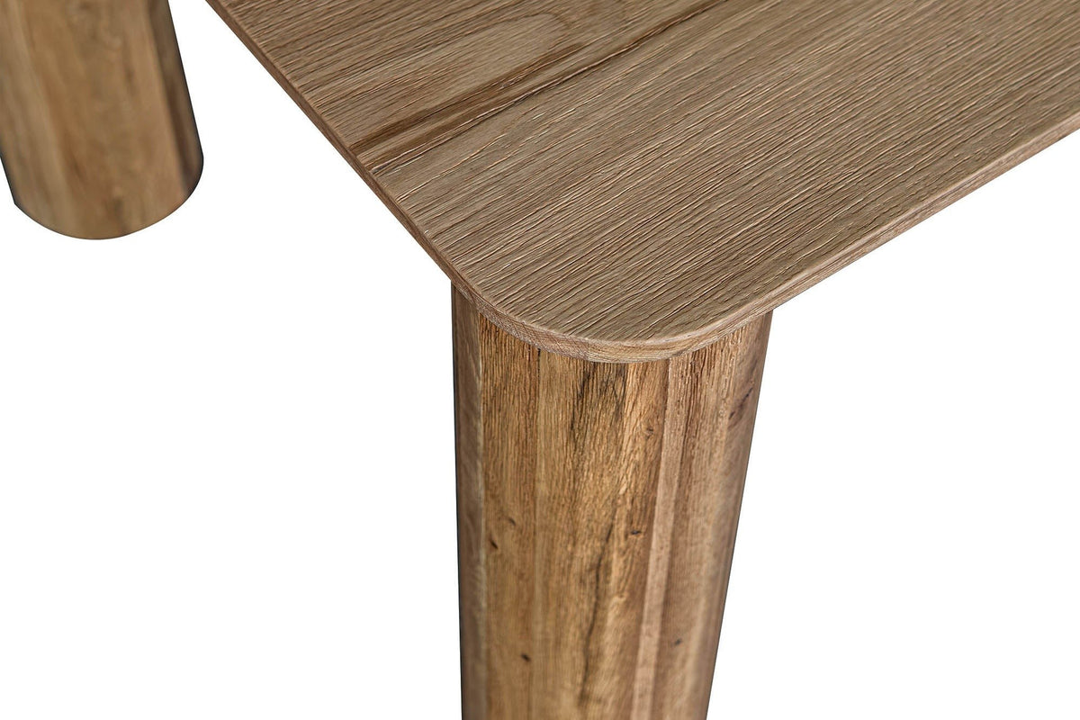 Close-up of an Atzara corner from above: the rounded corner, the softly eased edge and the column leg under it