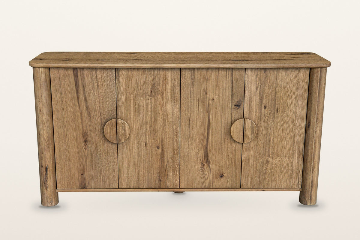 Atzara sideboard in Natural, straight front view on a warm white studio backdrop: four doors