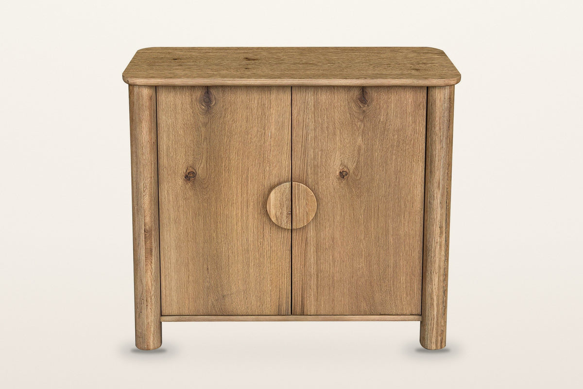Atzara Small sideboard in Natural, straight front view on a warm white studio backdrop: two doors meeting at the centre