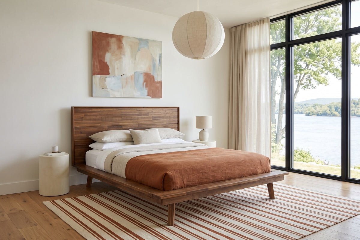 Bassiano bed in Warm Pecan in a bedroom in an Ottawa river house, three-quarter view, with warm white limewash