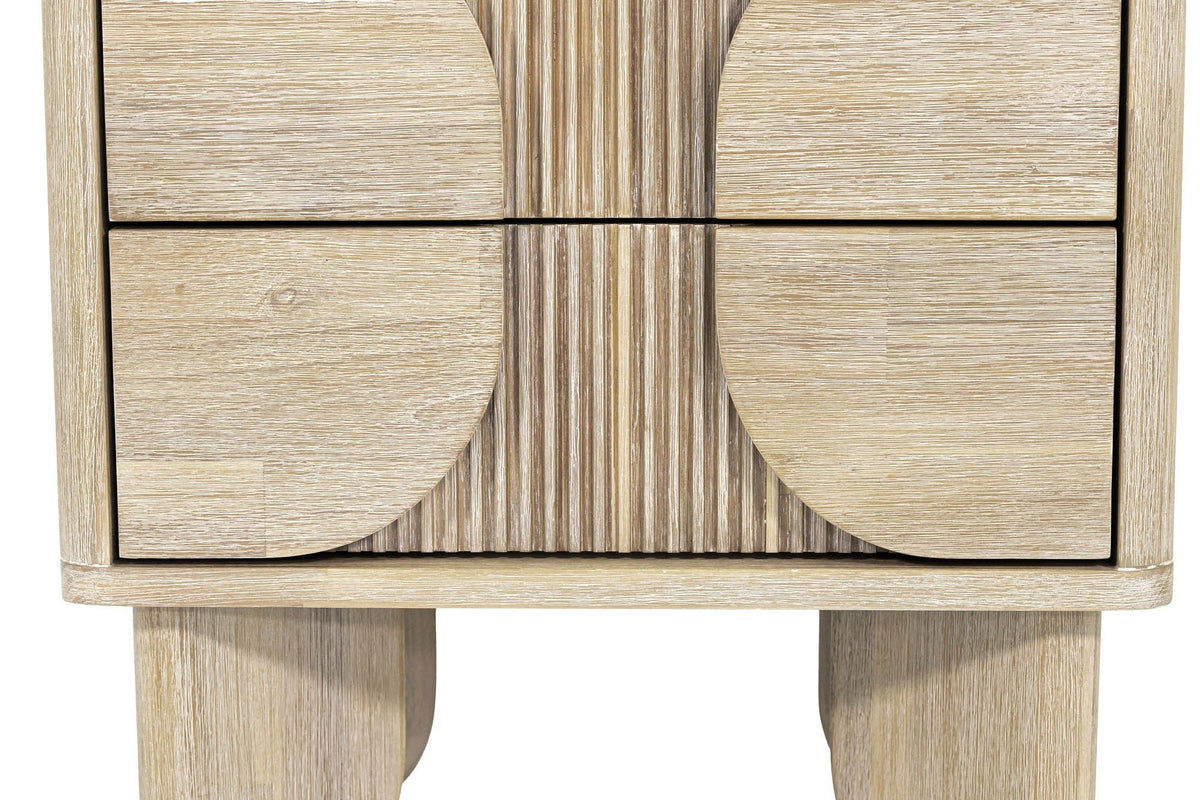 Close-up of the Bienno front in Sand Wash: the half-round drawer panels, the fine fluting between them