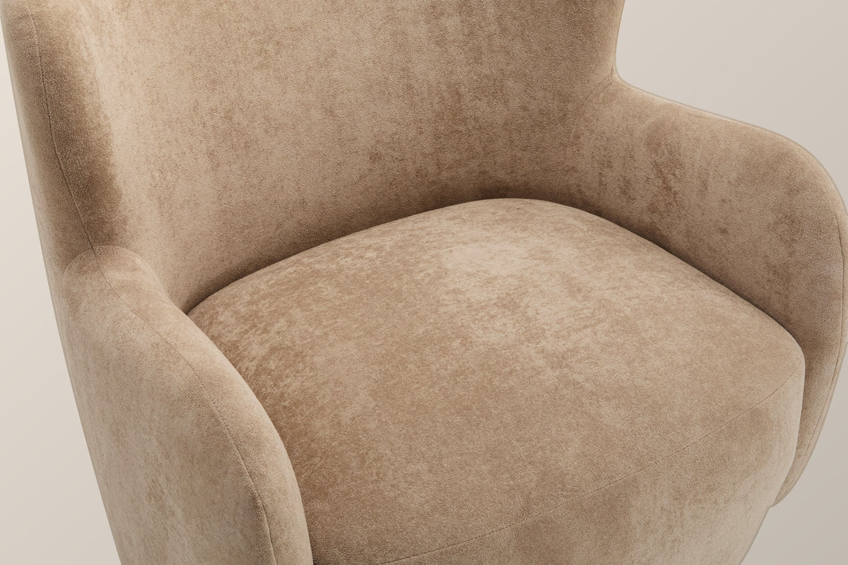 Close-up of the light camel velvet seat and arm, with the single seam along the front of the seat