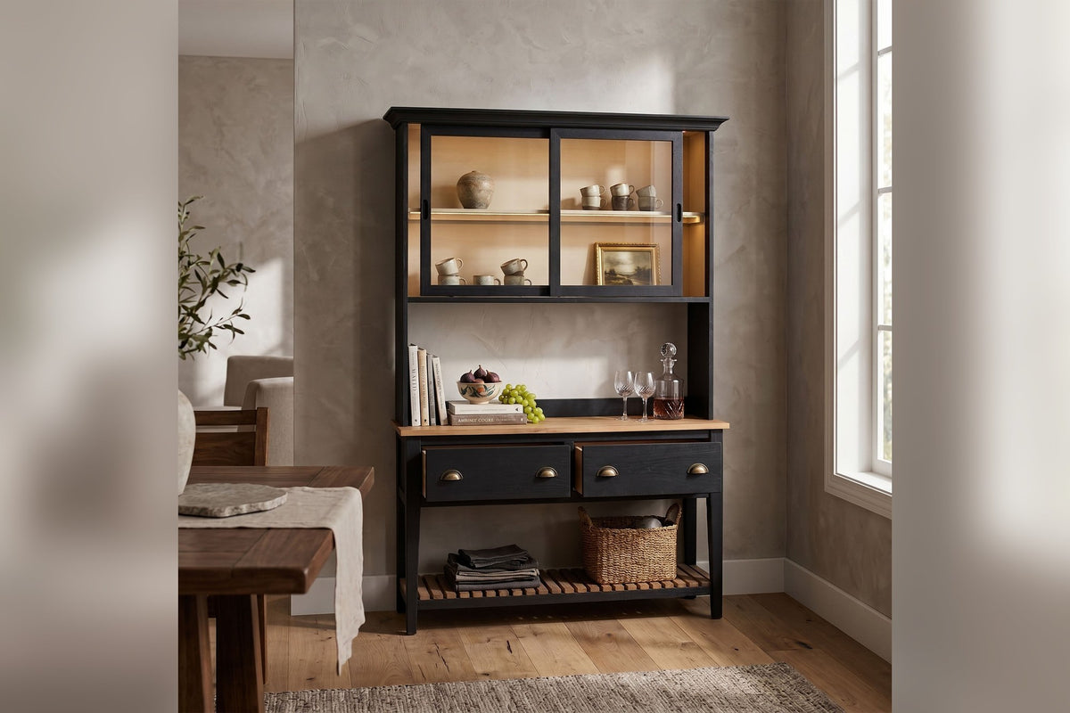Bramwell black hutch and sideboard styled with ceramics beside a window