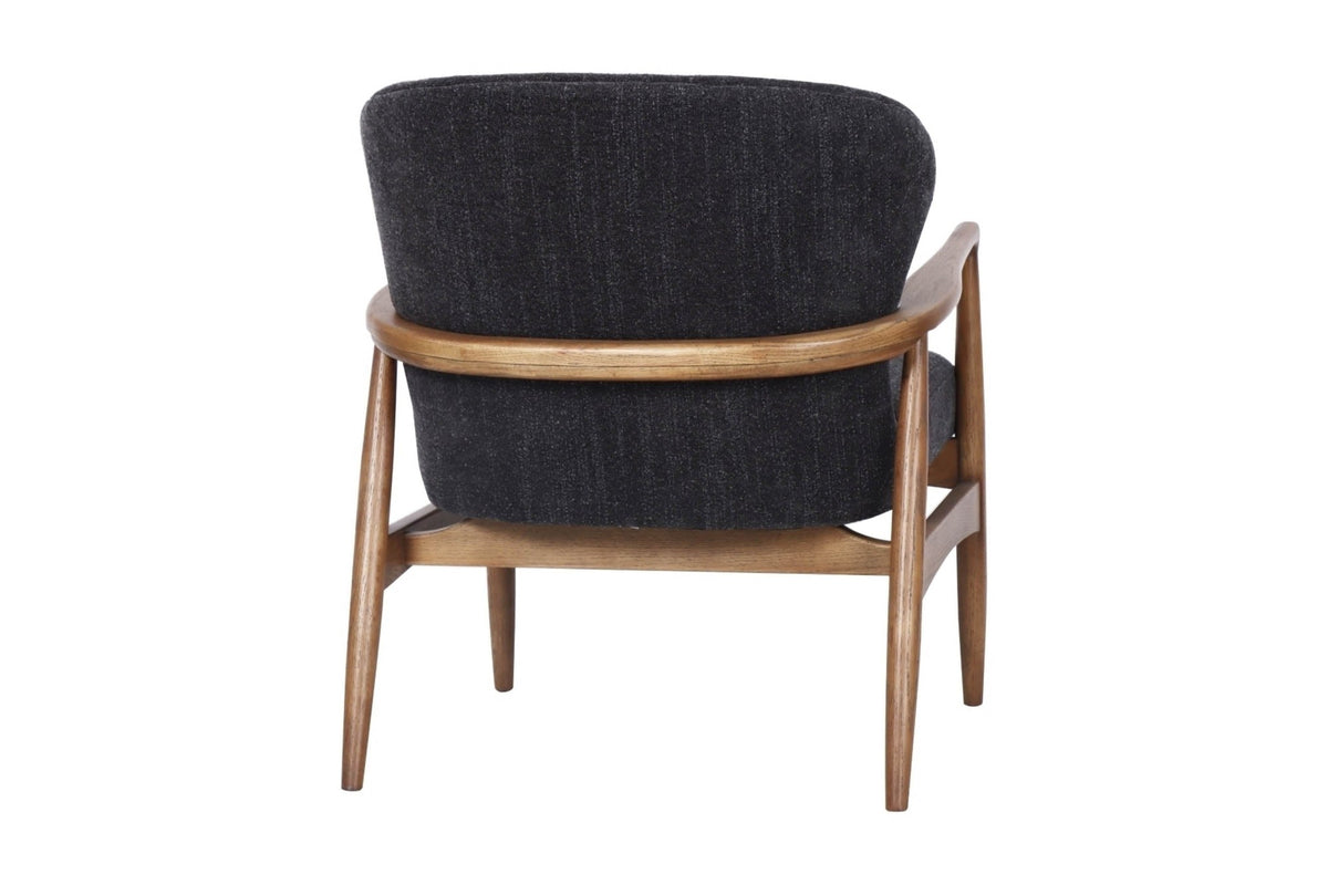 Briar accent chair in Inkwell, back view with curved ash rail
