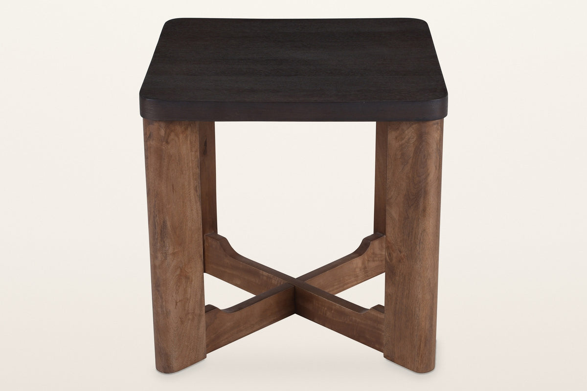 Calcata side table seen from the front: a mocha top on four plank legs and a low X stretcher