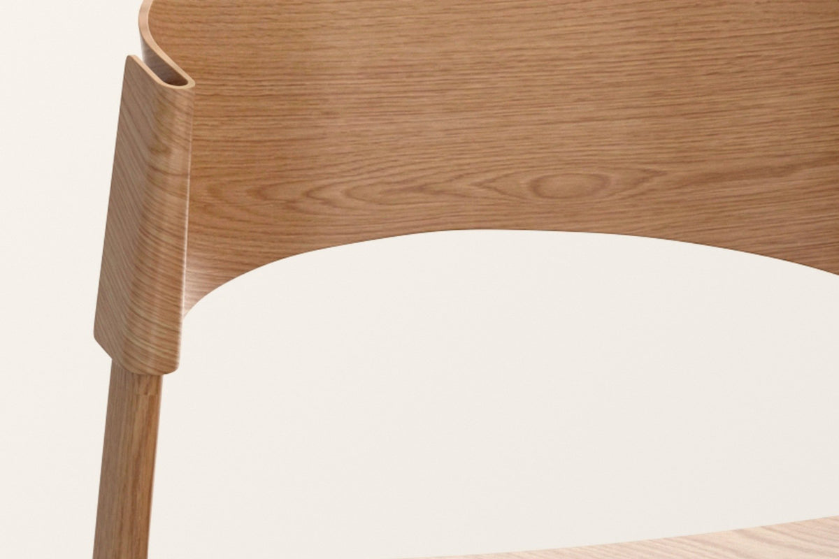 Close-up of the Canelli back in natural: the bent band folding around the back post and the oak grain