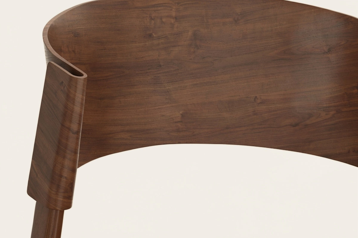 Close-up of the Canelli back in walnut: the end of the bent band folding around the back post