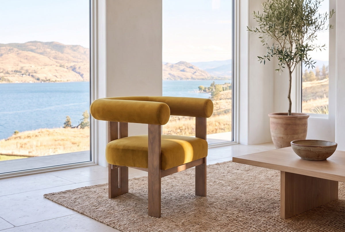 Caorle chair on a jute rug in a Kelowna lake house with tall windows onto the lake and hills (Mustard Yellow)