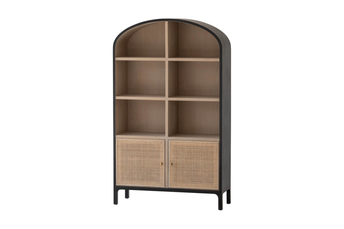 Carver arched tall cabinet in matte black with rattan doors, three-quarter view