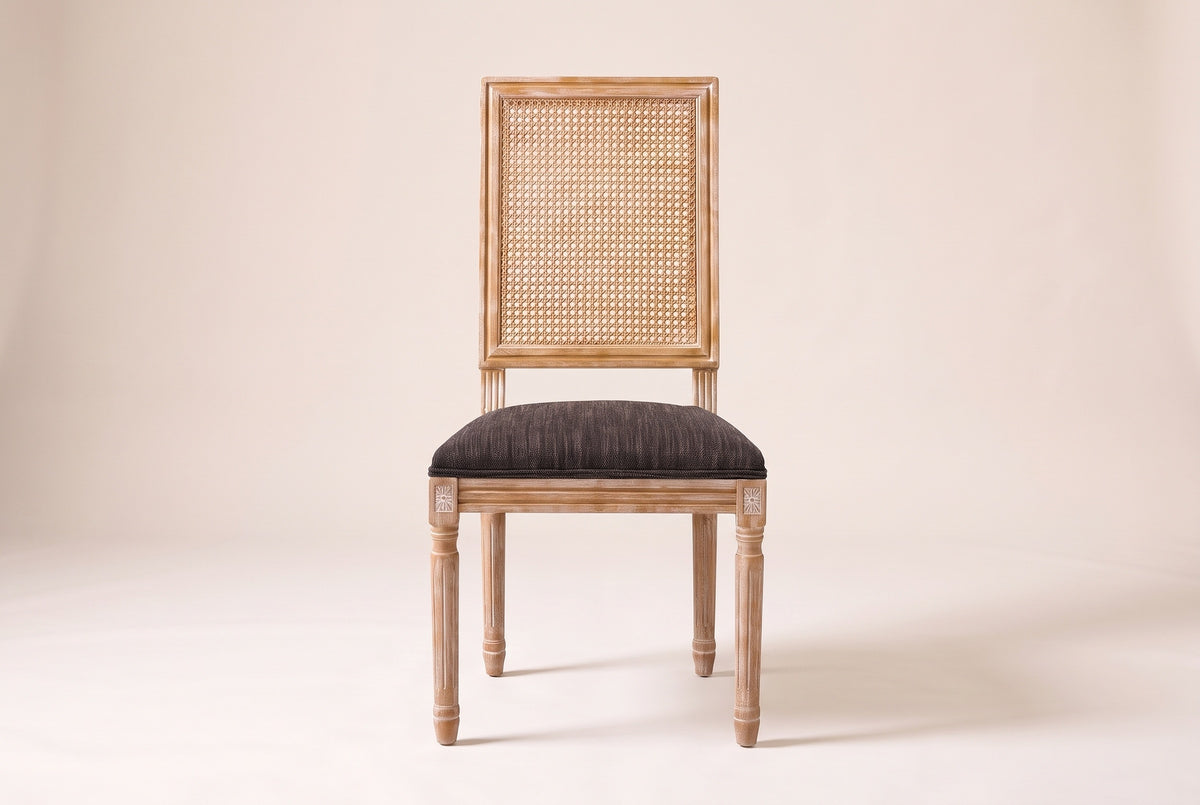 Castelfranco dining chair in Brown, straight front view showing the cane-look back