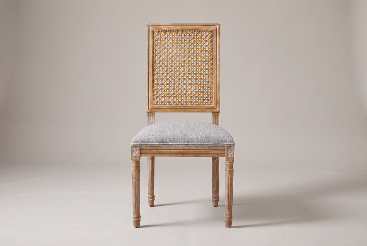 Castelfranco dining chair in Light Grey, straight front view showing the cane-look back