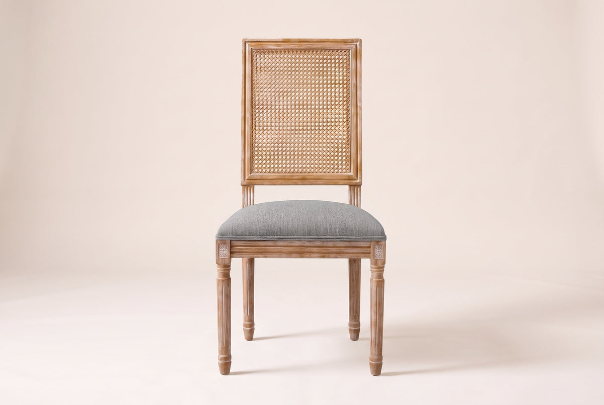Castelfranco dining chair in Mid Grey, straight front view showing the cane-look back