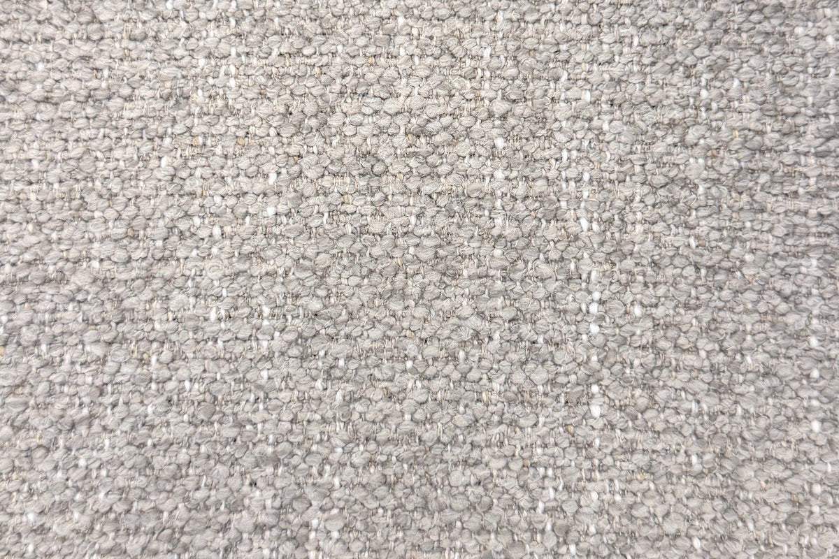 Close-up of the beige multi-tone boucle: small loops in grey and ivory with flecks of pale gold