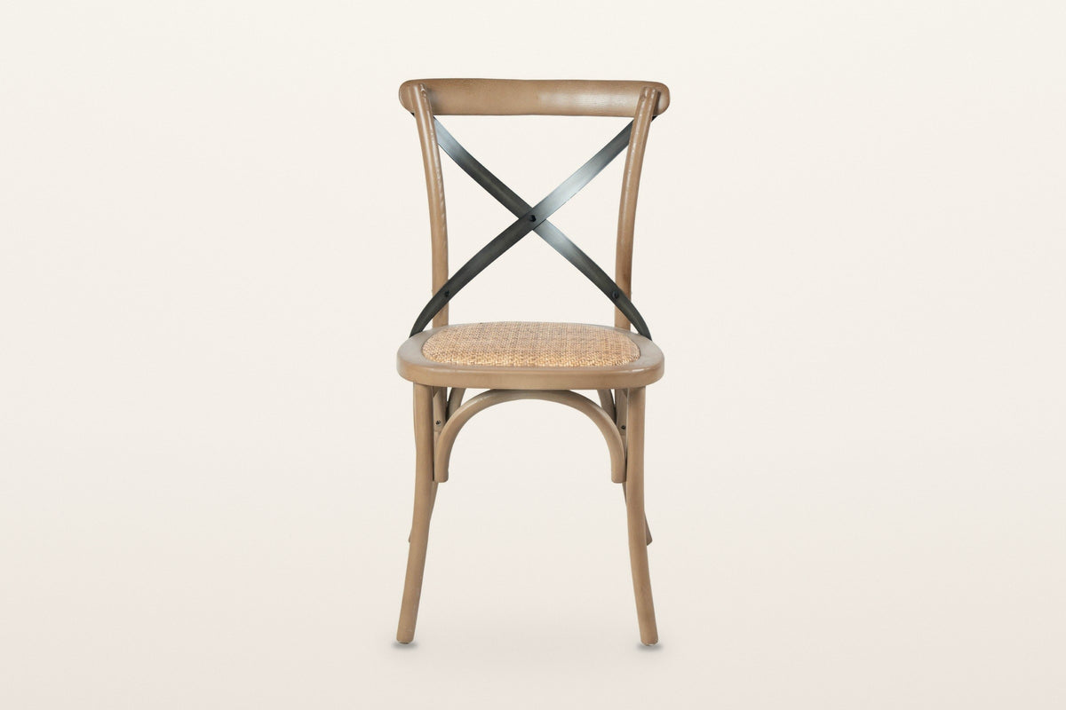 Castelmola dining chair in Sundried, front view on a warm white studio backdrop
