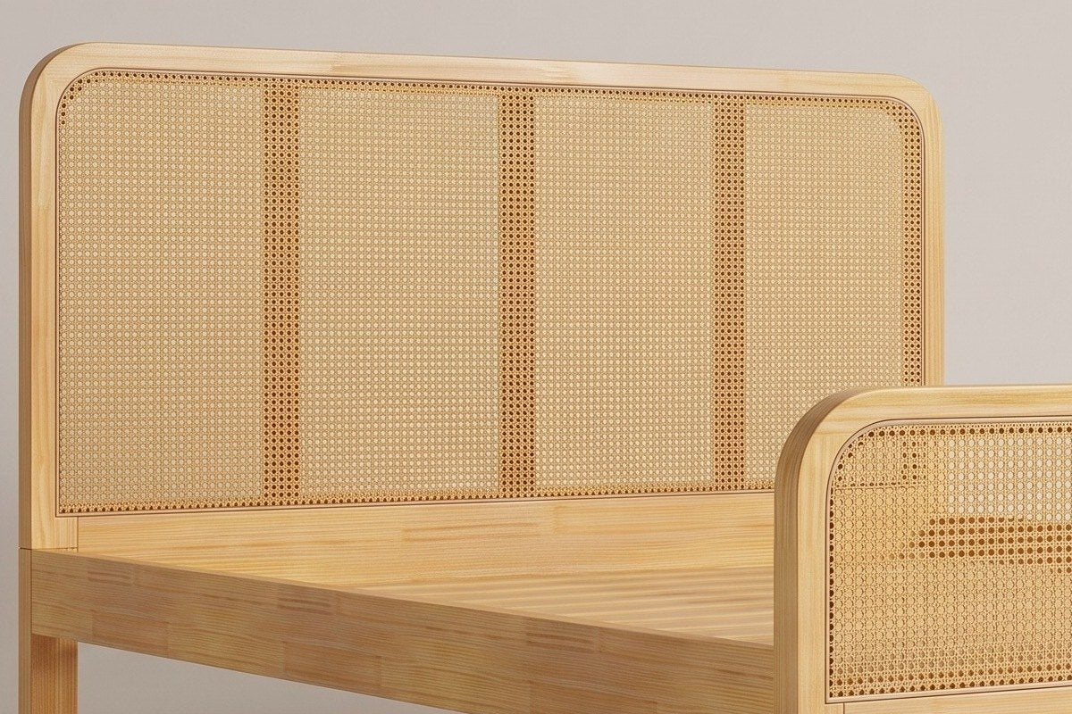 Close-up of the Certaldo headboard: the rounded wood frame and the woven cane-style panel in four bays