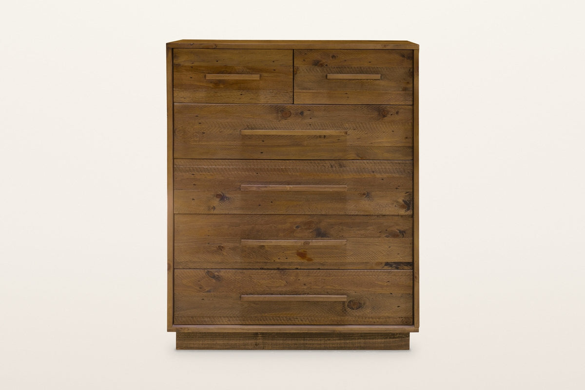 Cervinia chest from the front: two small drawers side by side above four full-width drawers, each with one slim wooden bar pull