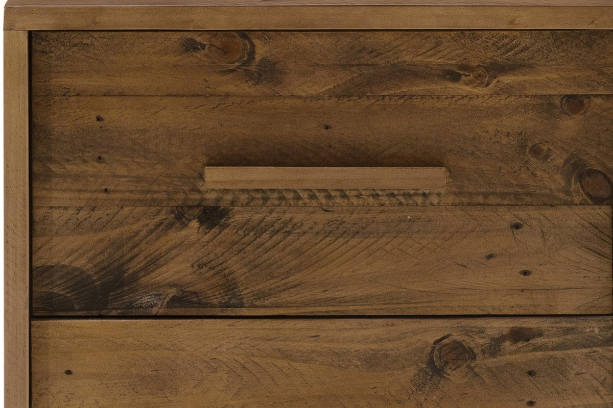 Close-up of the Cervinia nightstand's drawers: reclaimed pine planks with knots, nail holes and saw marks, and a slim wooden bar pull