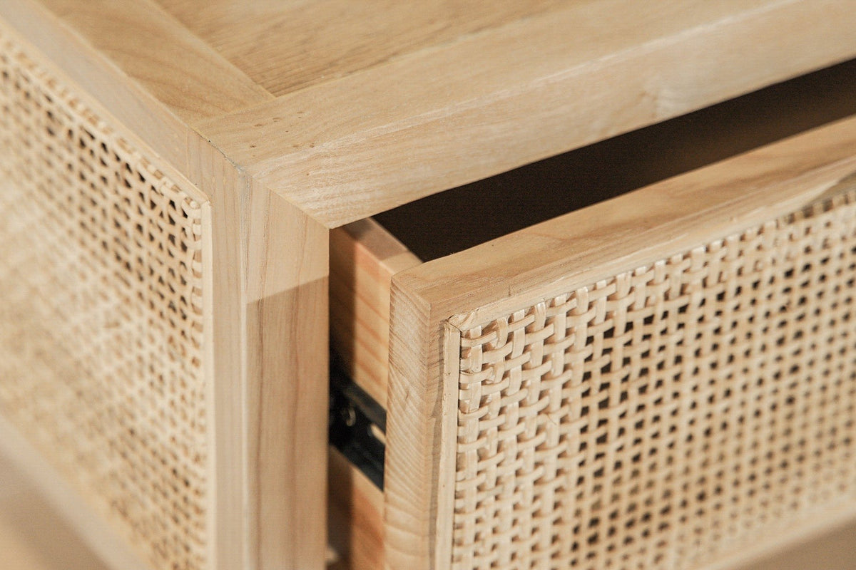 Close-up of the Cetara top corner with the drawer pulled out: the framed wicker side panel