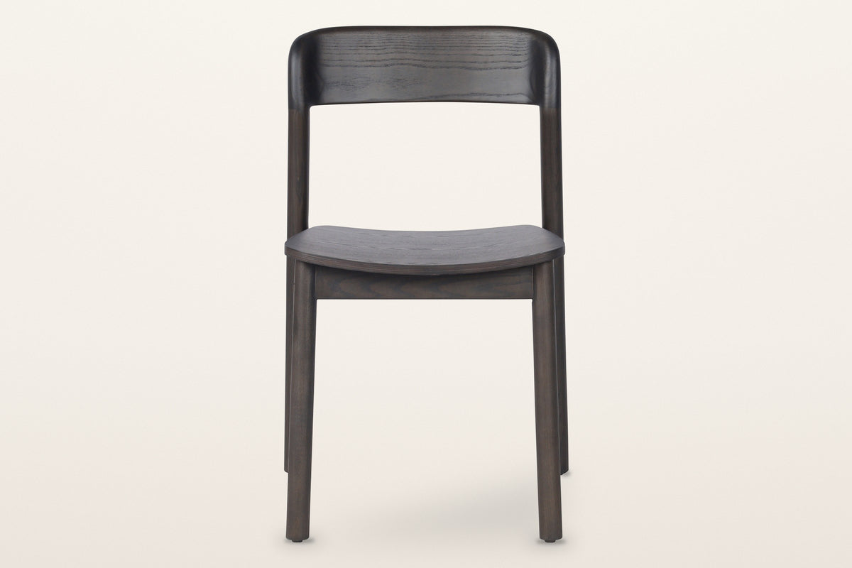 Chiavenna dining chair in mocha, straight front view: the curved back rail, the thin seat and four round legs