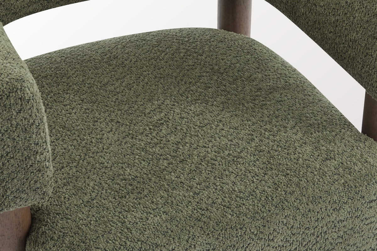 Close-up of the Olive Green boucle seat and the squared-off arm of the Cingoli chair