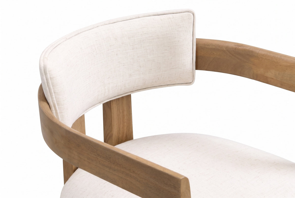 Close-up of the flat horseshoe arm rail wrapping the slim back pad of the Cisternino chair