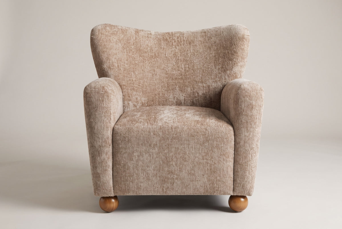 Collodi chair in Beige Brown, straight front view: waved wingback, two round arms, solid wood ball feet