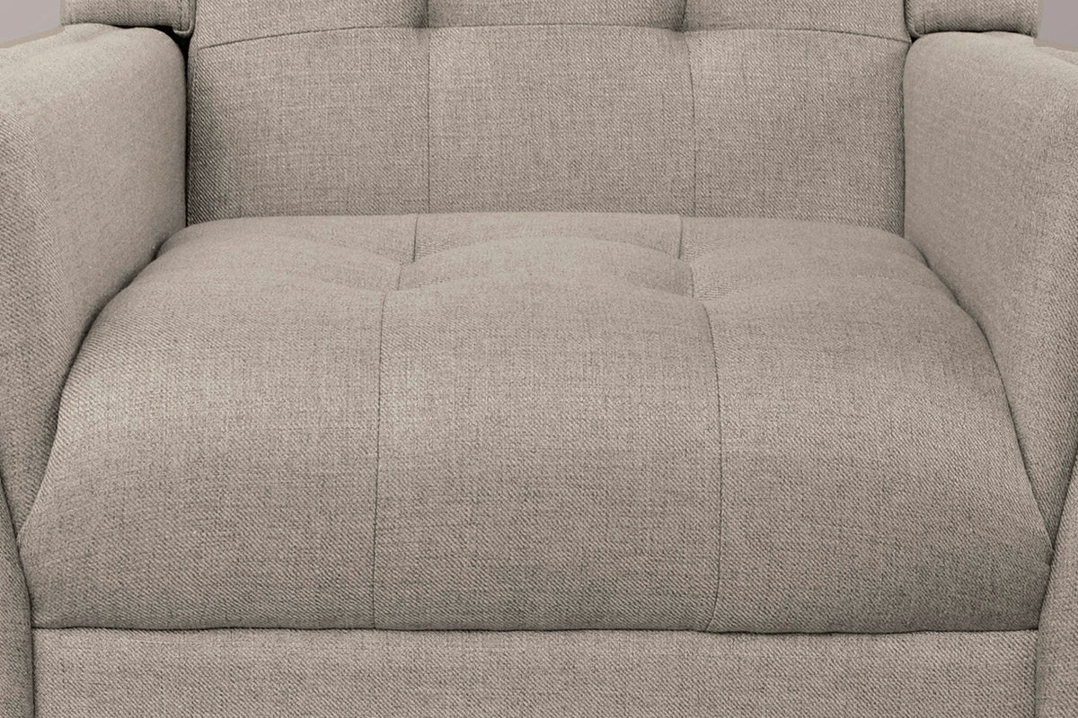 Close-up of the tufted light brown seat and lower back, with the sewn tufts and the woven fabric