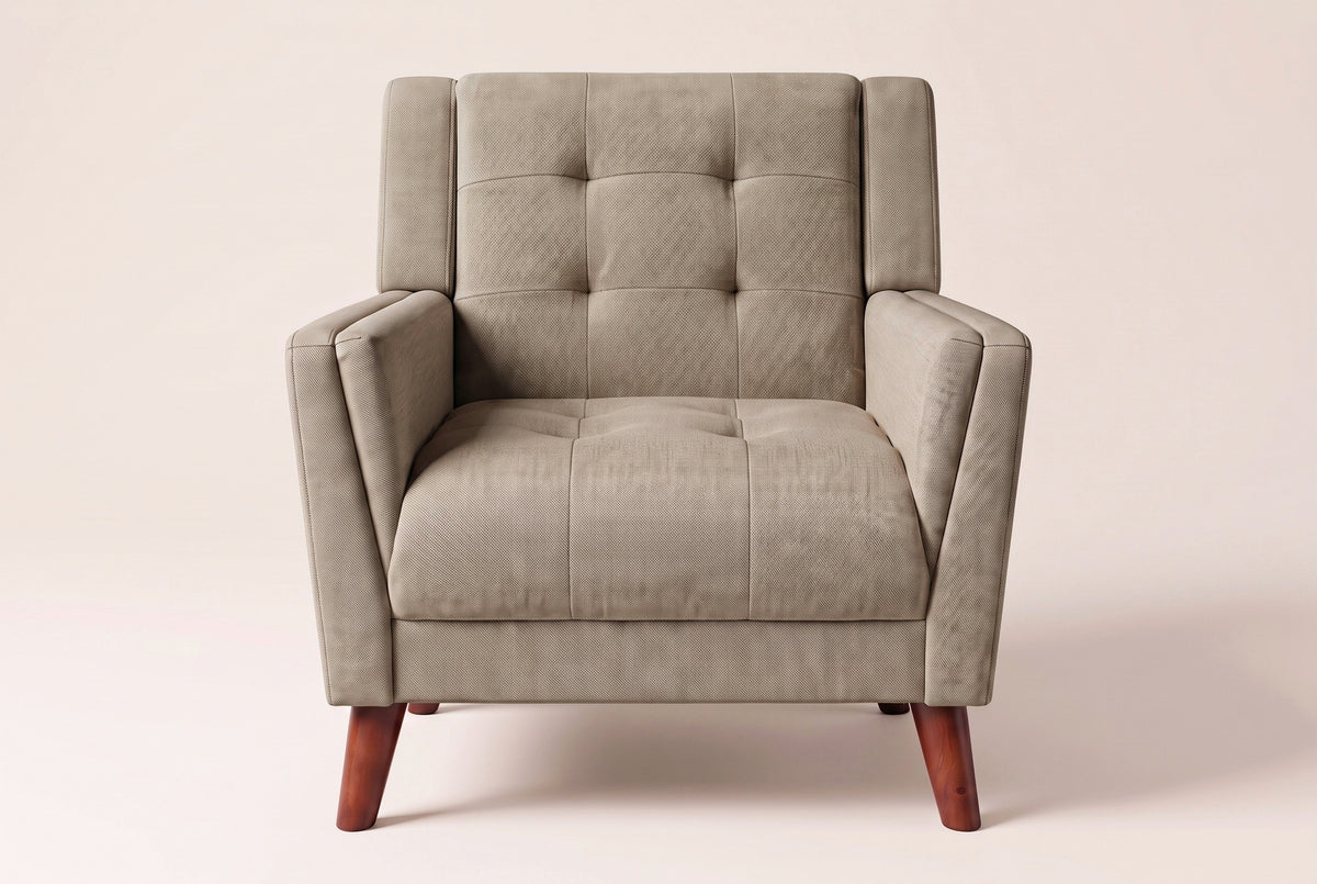 Comacchio armchair in light brown, straight front view: tufted back between two upright posts, flared track arms