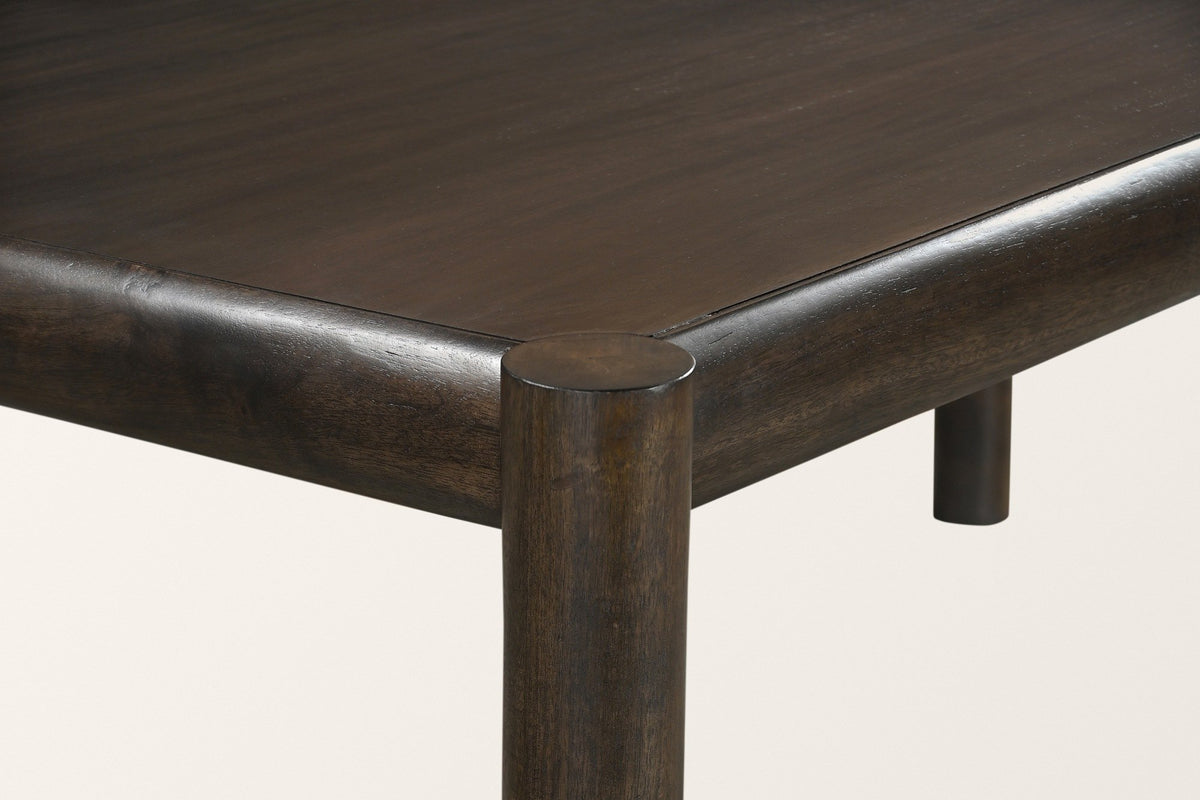 Close-up of a Corniglia corner in mocha: the round leg top, the rounded rails and the dark espresso finish