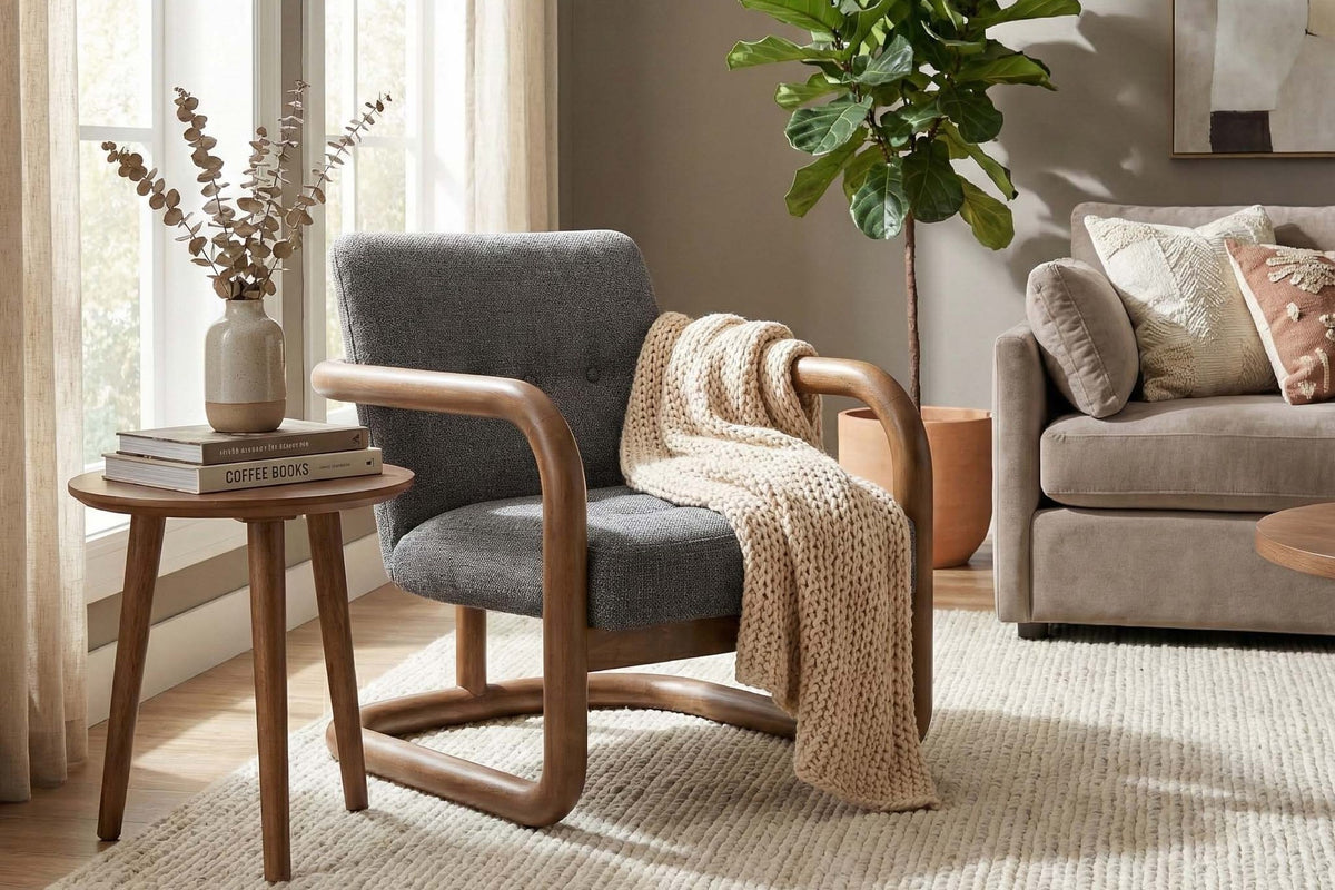 Corwin Charcoal accent chair with a knit throw in a sunny living room