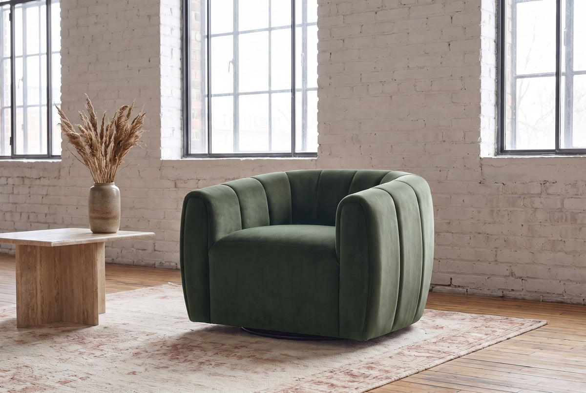 Cuneo swivel chair in olive green velvet in a Montreal loft with whitewashed brick, steel windows and a travertine side table