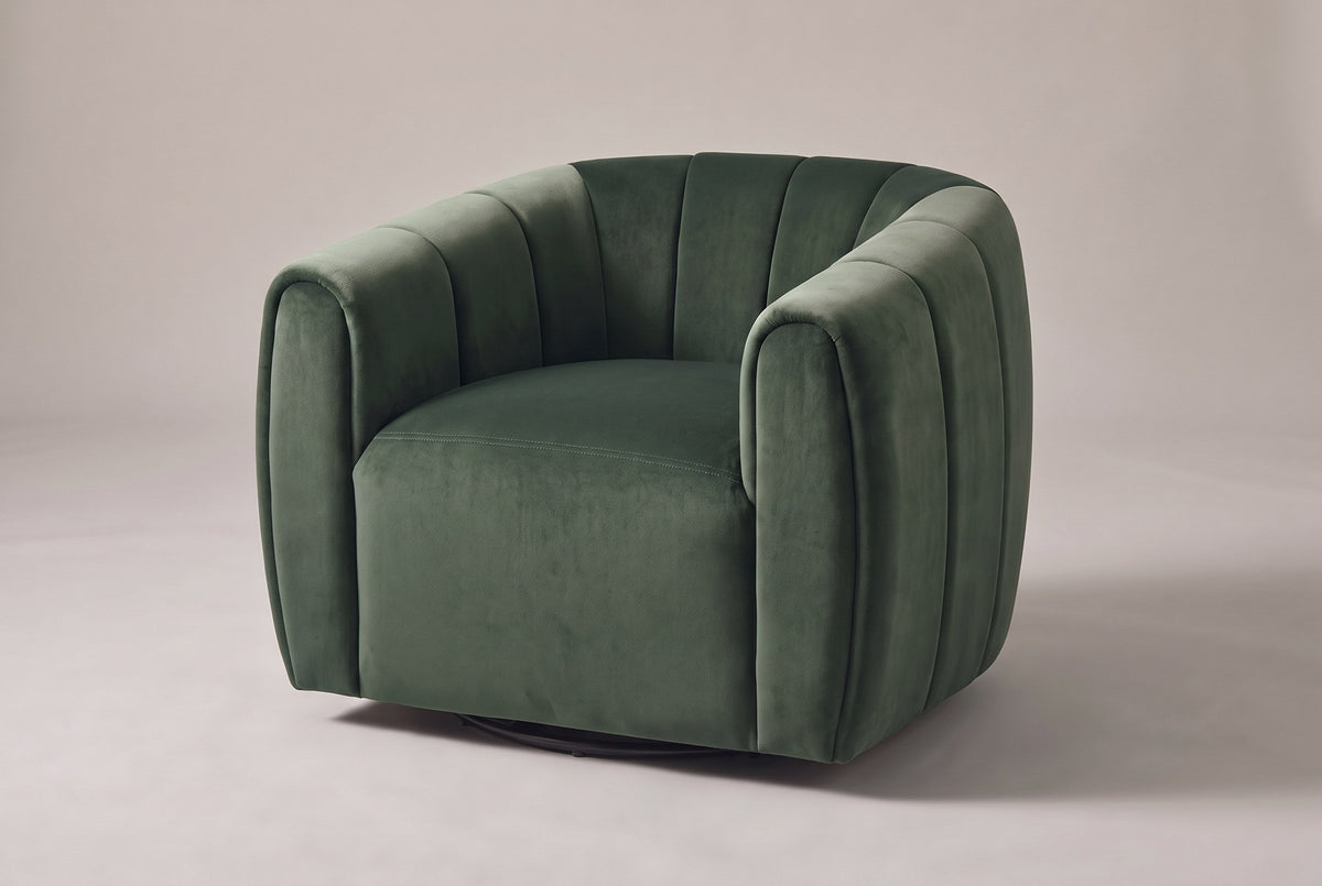 Cuneo channel-tufted velvet swivel chair in olive green, three-quarter view on a warm grey studio backdrop