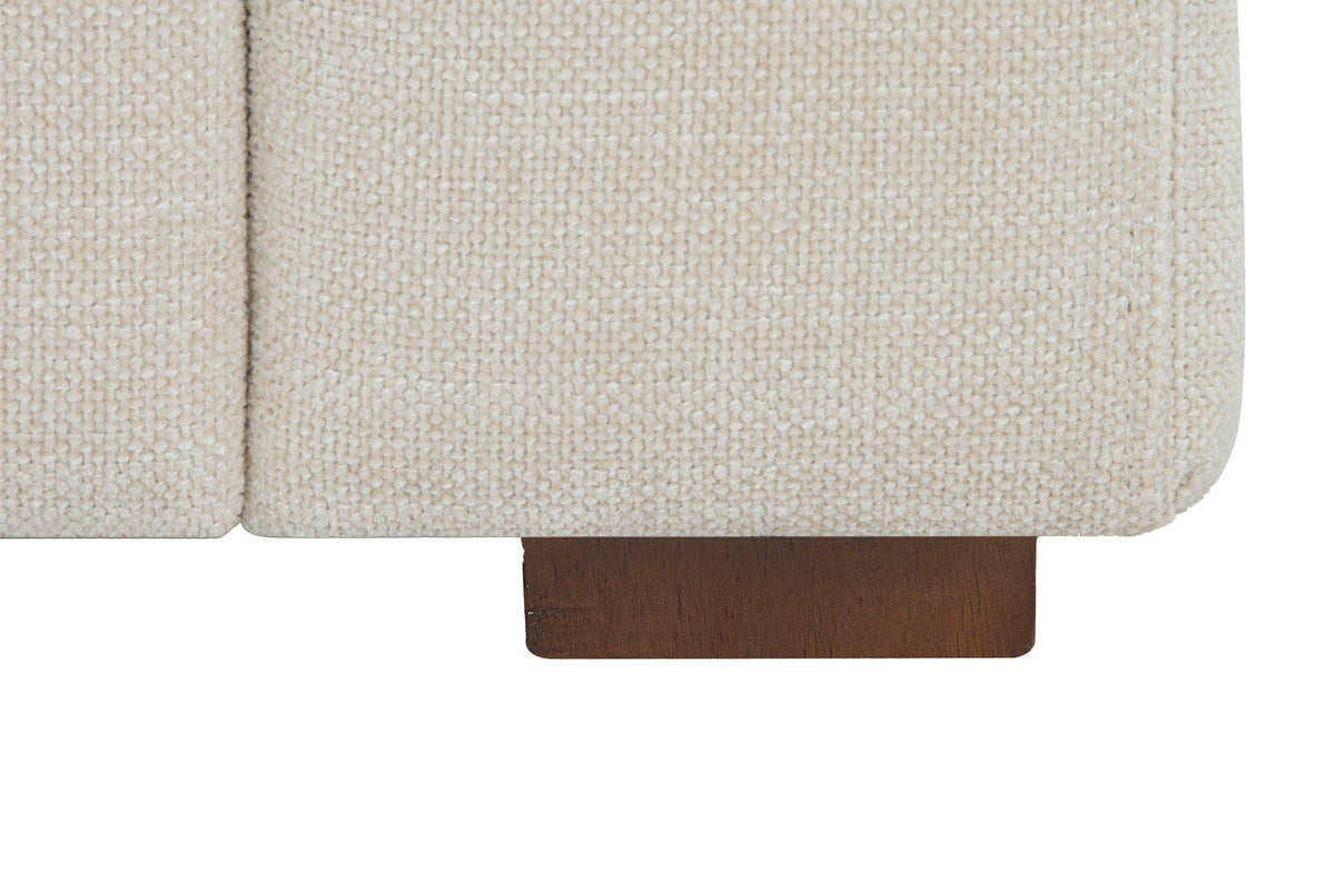 Close-up of a Cupramontana foot in Beige: a small square brown wood foot under the arm and the woven fabric above it