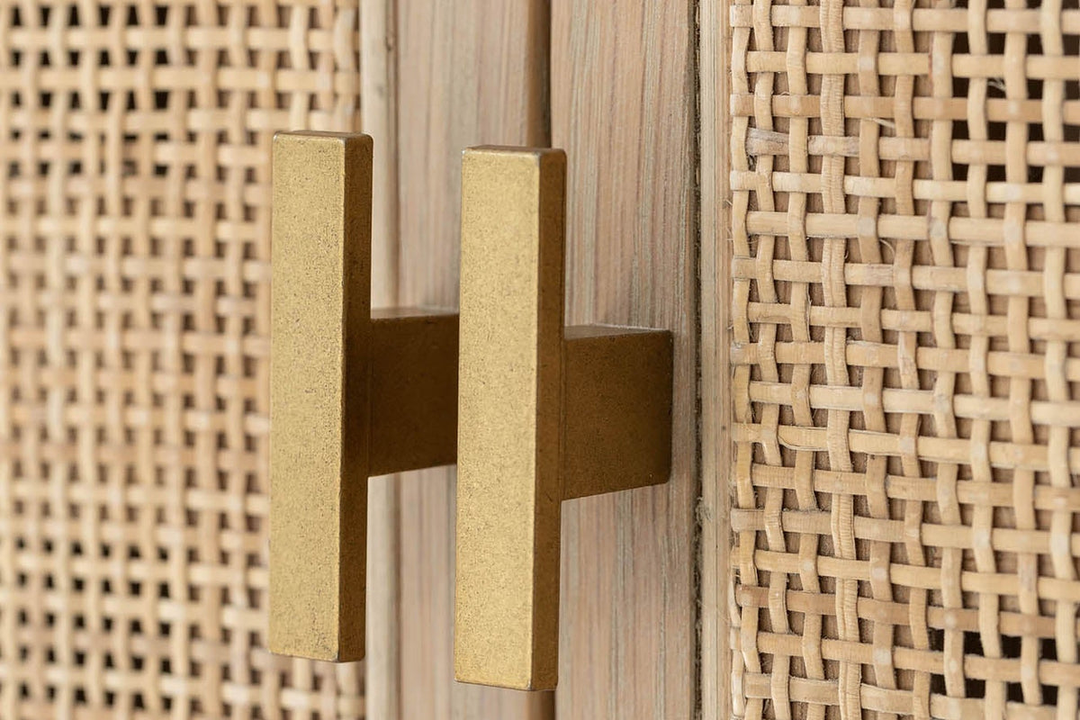 Close-up of the Dalton brass T-bar pulls on woven rattan doors