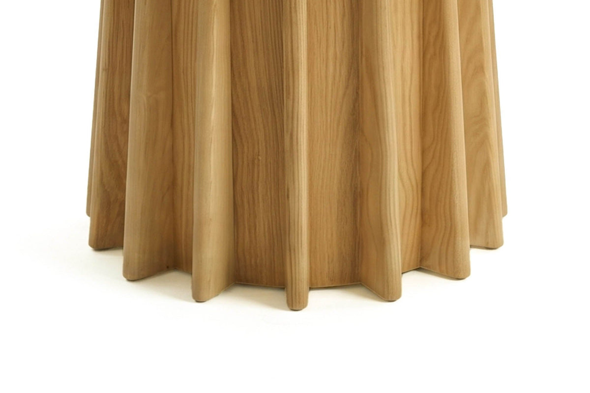 Close-up of the Elowen sculpted fluted oak pedestal base