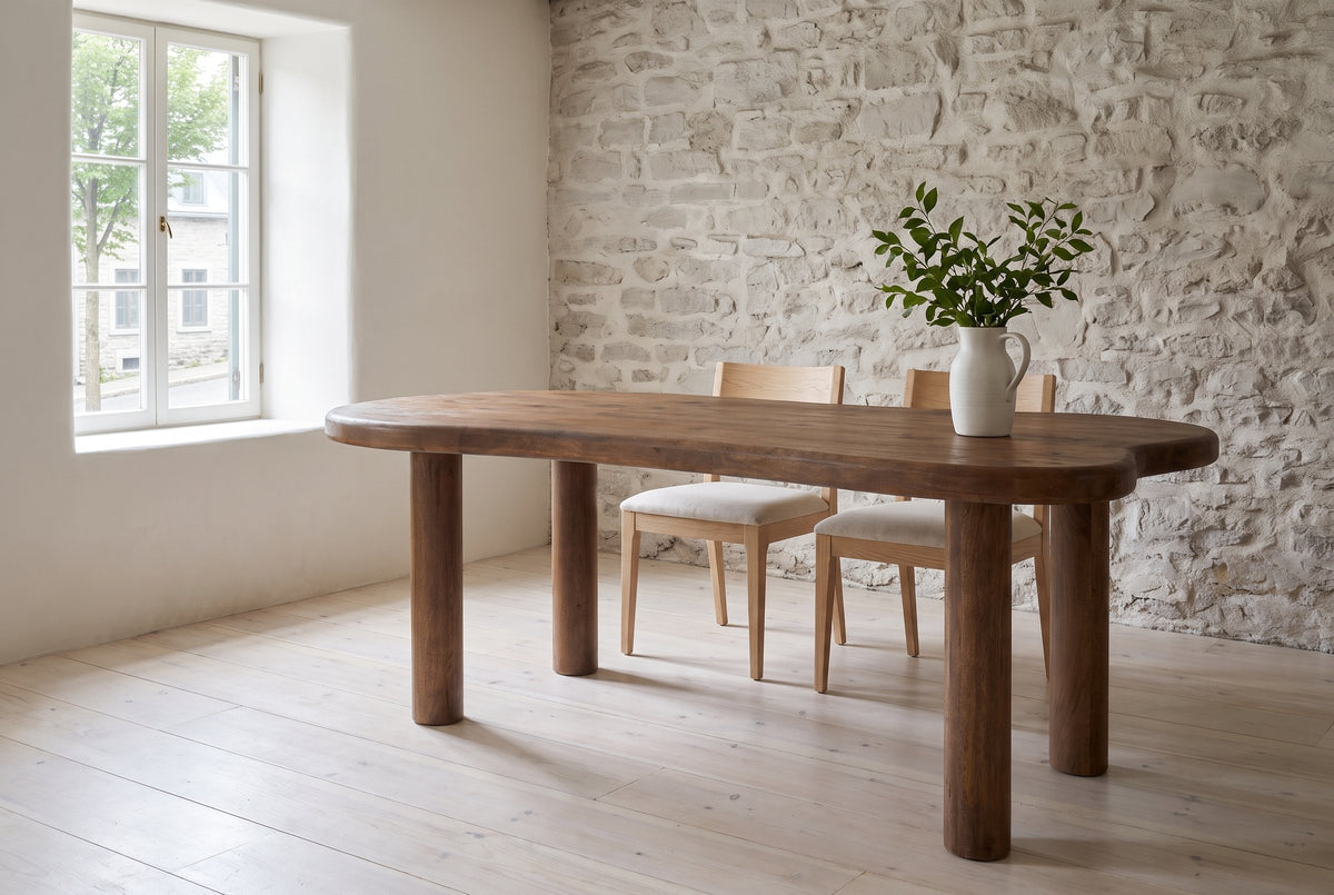 Erbusco dining table in dark walnut in a Quebec City stone-house dining room