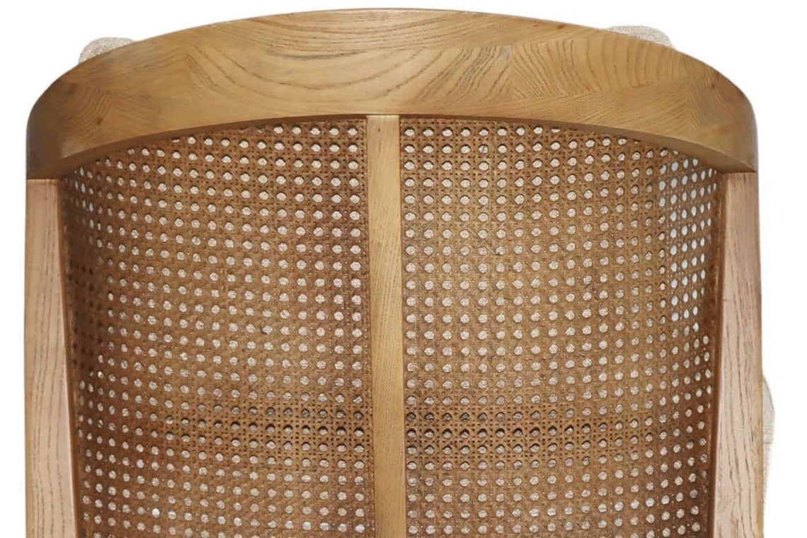 Close-up of the Esanatoglia back: open cane webbing in the ash frame, split by one centre splat