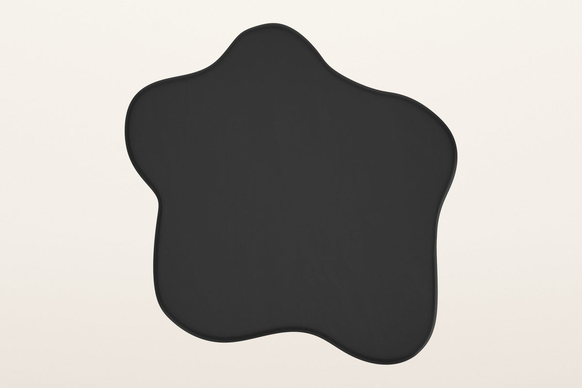 The large Exilles top in black seen from above: an irregular five-lobed cloud outline