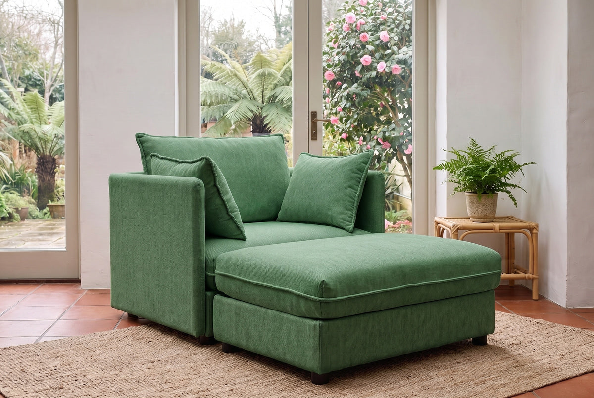 Faenza ottoman pushed against the green chenille chair to make a lounger