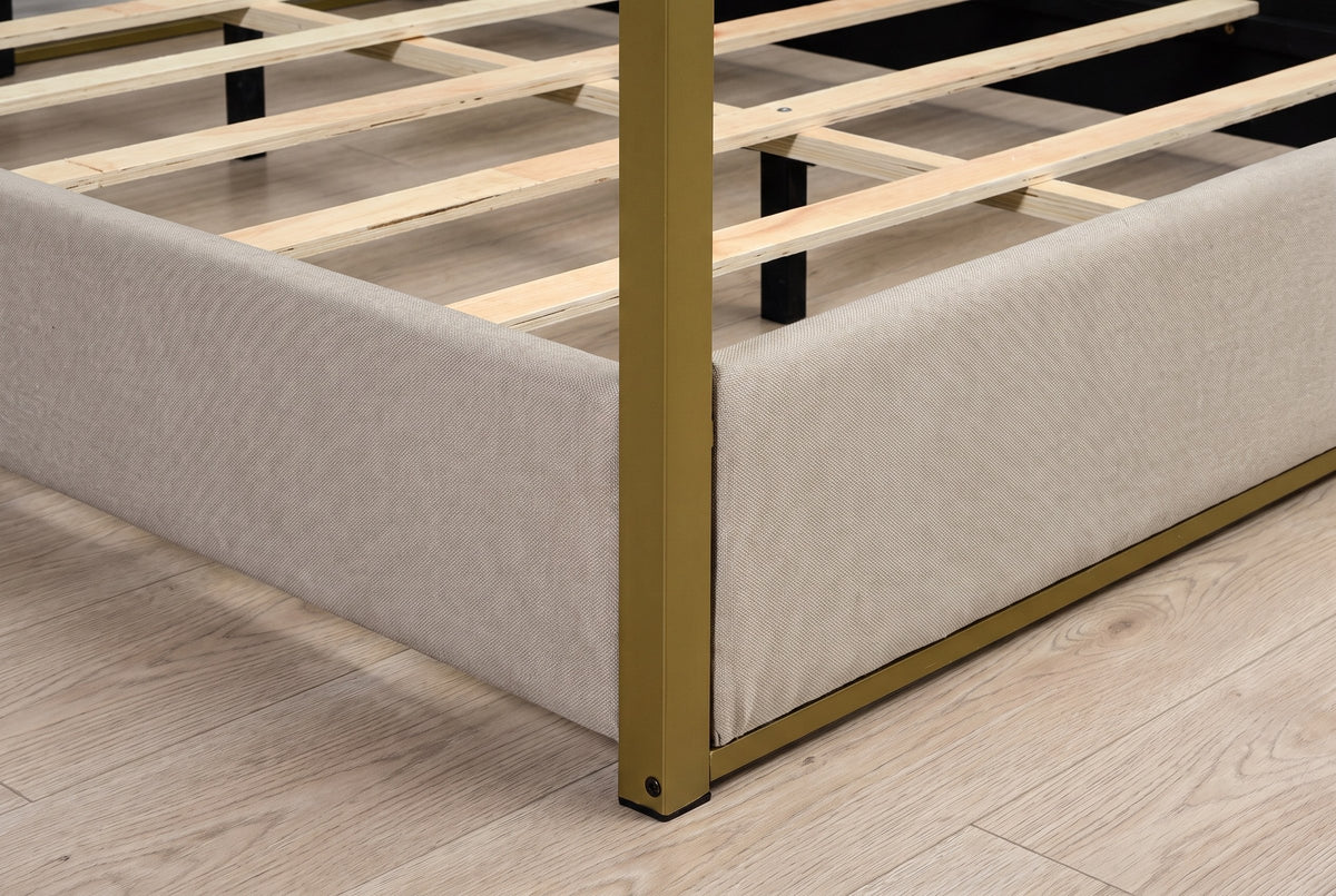 Close-up of a gold corner post, the upholstered rail and the gold floor bar