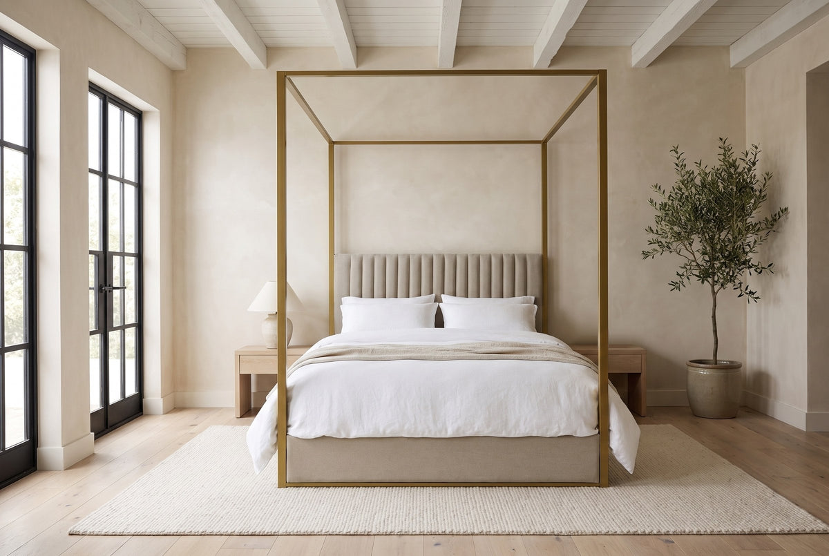 Fermo canopy bed made up with white bedding in a loft bedroom with tall black-framed windows and an olive tree