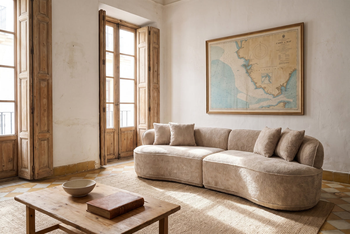The Fiora sofa in Camel in a Cadiz townhouse with encaustic tiles and shuttered balcony doors